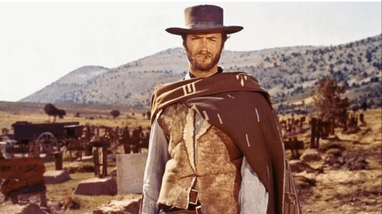 Clint Eastwood in una scena iconica di uno spaghetti western di Sergio Leone, esempio di stile cinematografico unico e riconoscibile.