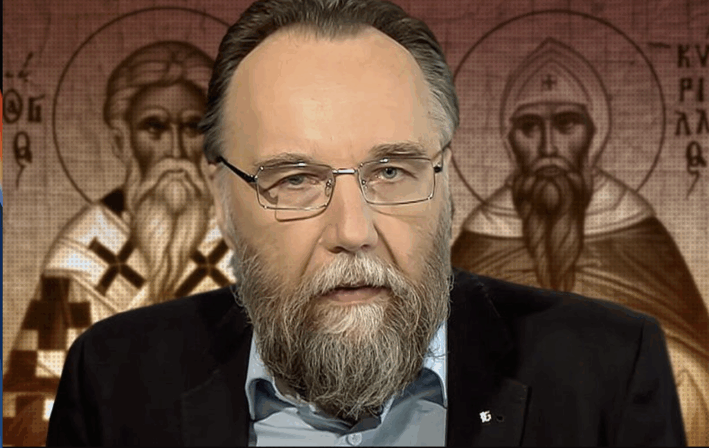 ritratto di aleksandr dugin, sullo sfondo icone religiose ortodosse